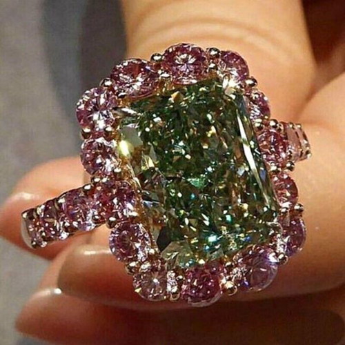Ring new with cubic zirconia, red and green stones