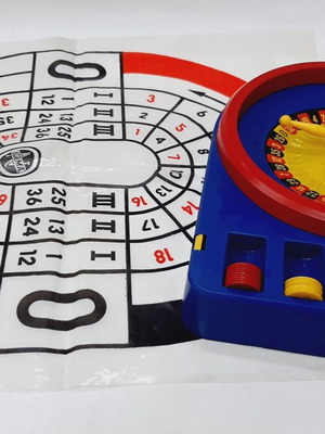 Vintage children's roulette game, like new, blue plastic, nylon mat