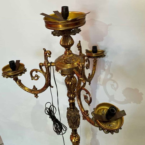 Vintage brass floor lamp with ornate baroque designs used