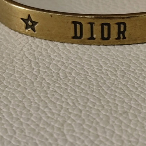Christian Dior brass cuff bracelet like new, gold tone