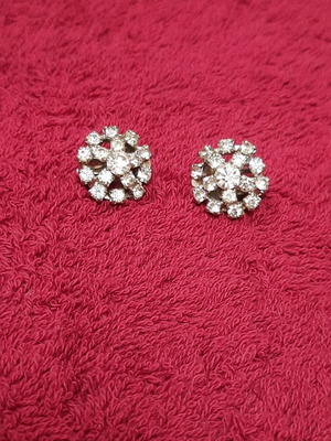 Vintage clip earrings with crystal flower snowflake design used