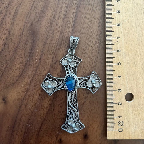 Vintage filigree cross with blue stone like new
