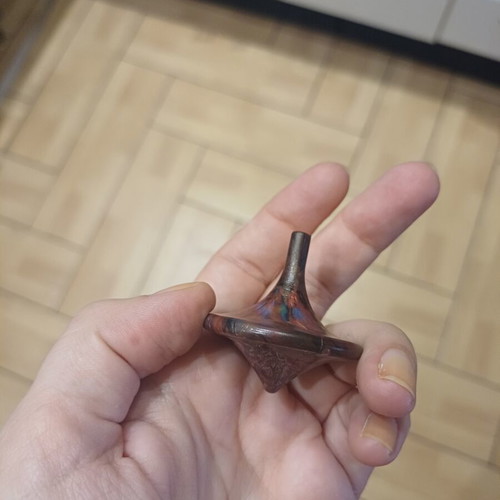 Spinning top made of recycled plastic caps, new