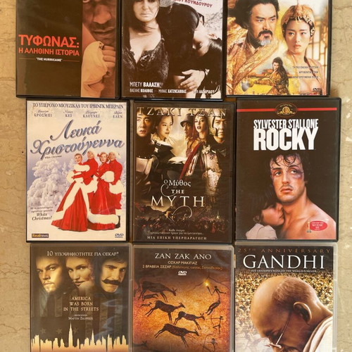 40 DVD movies in slim cases