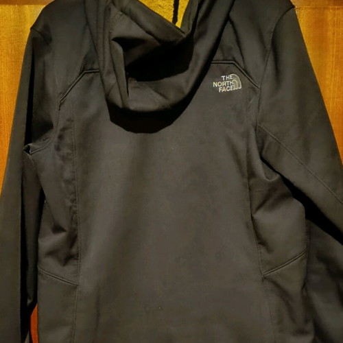 The North Face jacket used, size S, black and yellow