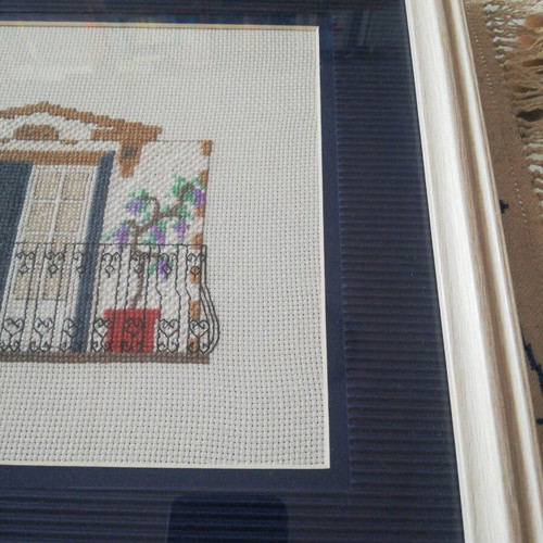 Embroidered textile painting with wooden frame
