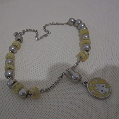 Vintage knotted AEK komboloi used with metal emblem