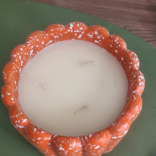 Decorative funky candle like new, bright orange