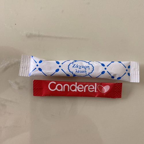 Sugar packet collection, 69 in holders plus 5 loose