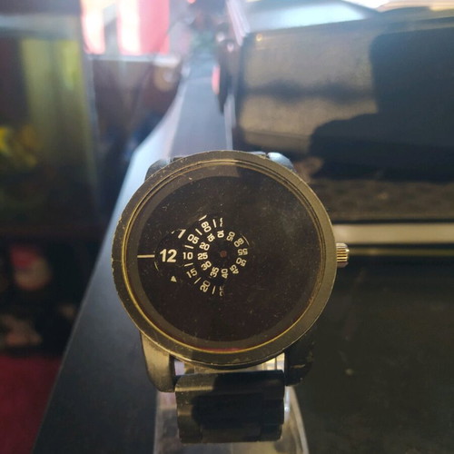Men's wristwatch used with unique dial and function