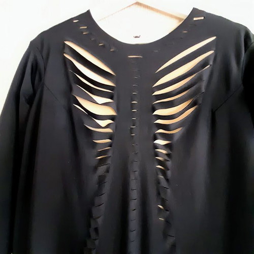 Black dress with beige lining and cutouts by Zero Waist Daniel