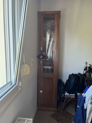 Wooden showcase like new with glass shelves and cabinet