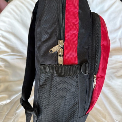 Backpack new with safety strip, black and red