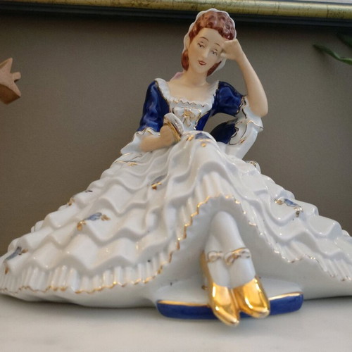 Royal Dux porcelain figure of woman reading book, new