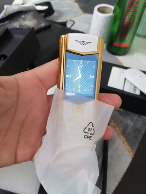 Vertu phone new, gold with metal leather body and dual card slot