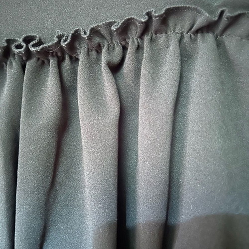 Women's blouse with ruffles black, like new, size M