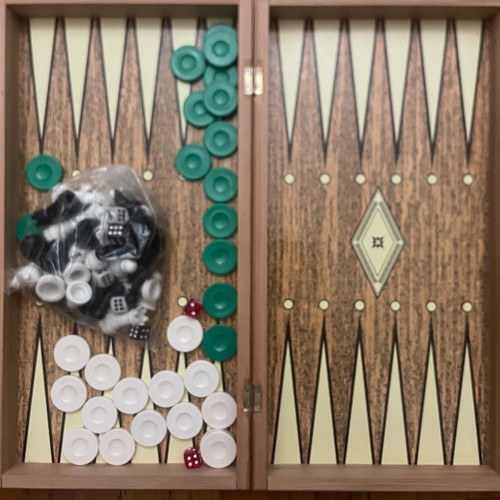 Backgammon like new with chess pieces and 3 pairs of dice