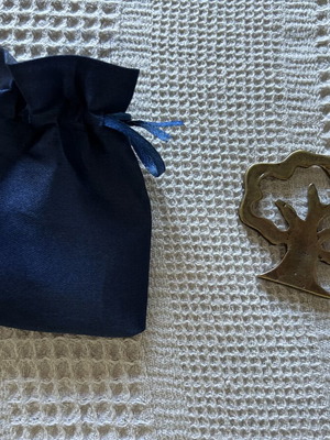 Bronze decorative tree with gift bag