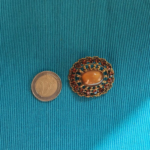 Vintage brooch used, gold color with crystals and cabochon
