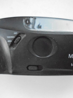 Minolta F10 analog camera used with flash