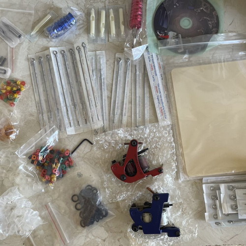 Dragonhawk Tattoo Coil Set used with extra practice materials