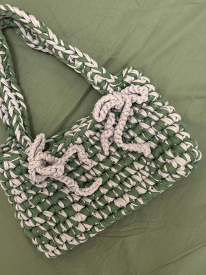 Handmade knitted bag green with lilac bows