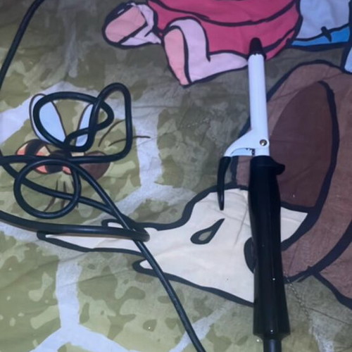 Hair curling iron used with some rust, functional