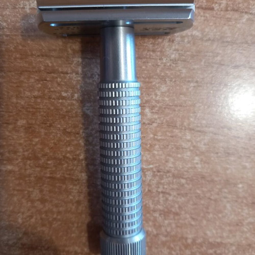 Rex Supply Co. Envoy shaving razor used with small top cap damage