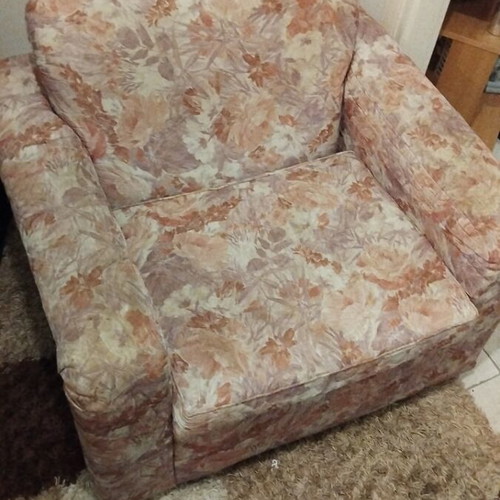 Armchair used with cover in good condition