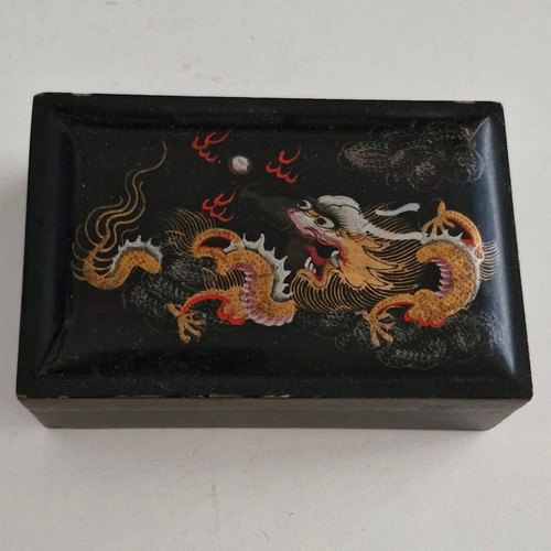 Wooden box used with painted Chinese dragon on black lacquer