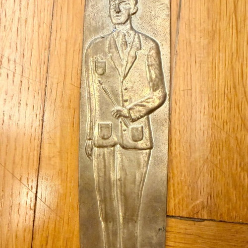 Vintage metal votive plaque with male figure used