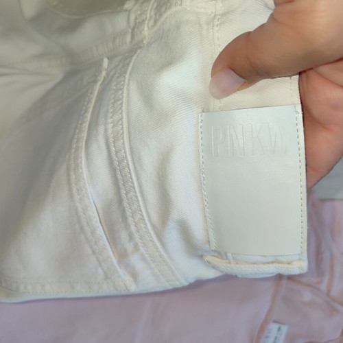 Zara pink bodysuit and white denim shorts set