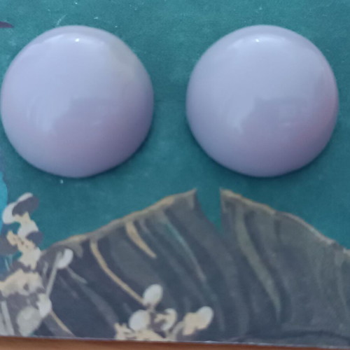 Plastic stud earrings set in lilac and dusty apple colors like new