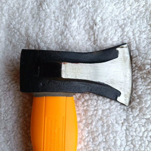 Wood axe used with plastic handle