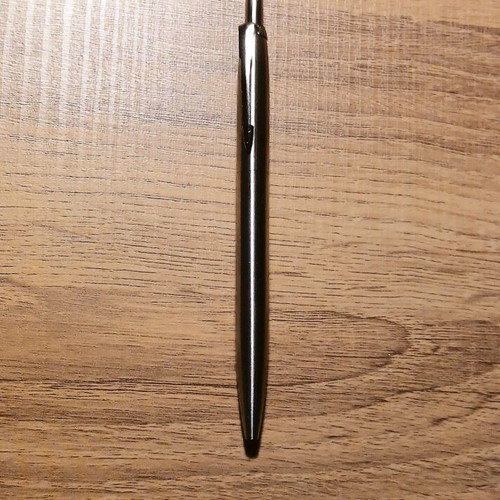 Metal pen silver color new with black ink