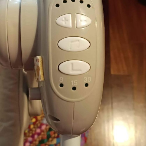Electric baby bouncer used with music