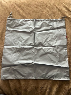 Prada case new, grey with red logo