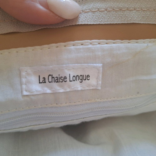 La Chaise Longue shoulder bag used with colorful embroidery