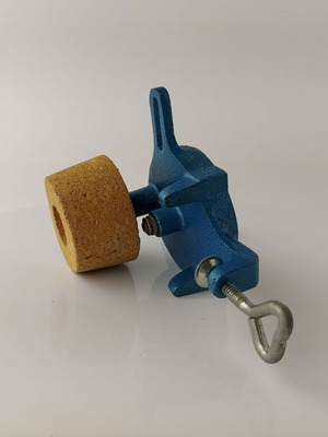 Old manual knife sharpening tool whetstone used with cork