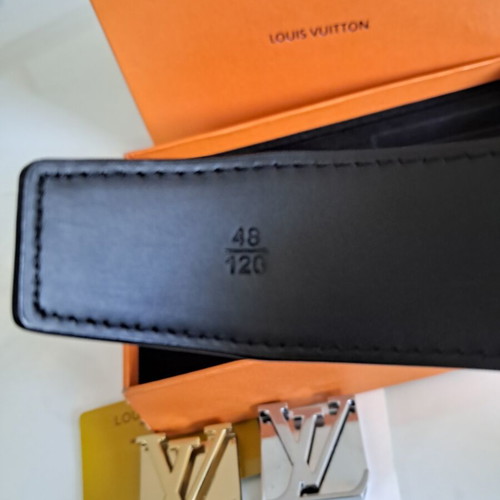Louis Vuitton leather belt with interchangeable buckles