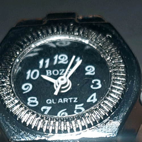 Ring watch quartz like new with black dial and silver bracelet