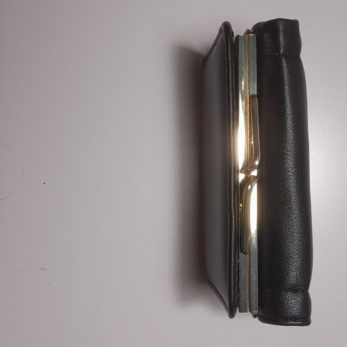 Black wallet new with gold emblem and beige lining