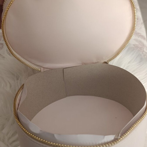 Gaultier Divine round vanity case, cream