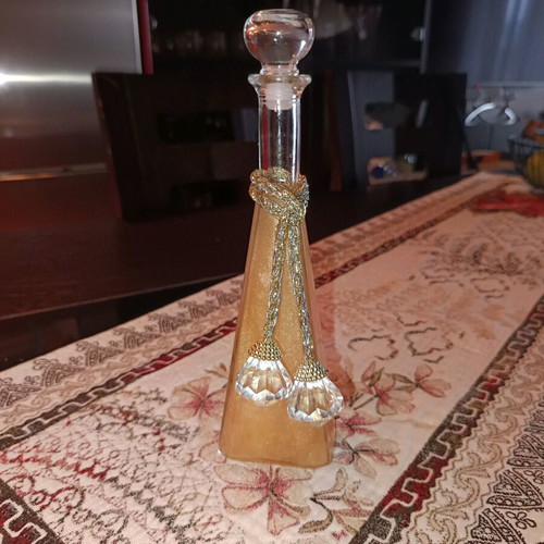 Decorative glass vase like new, gold color