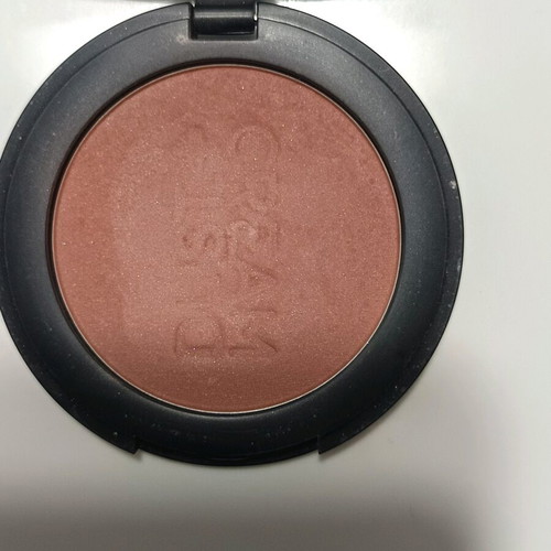 Dust and cream compact blush in coral brown shade