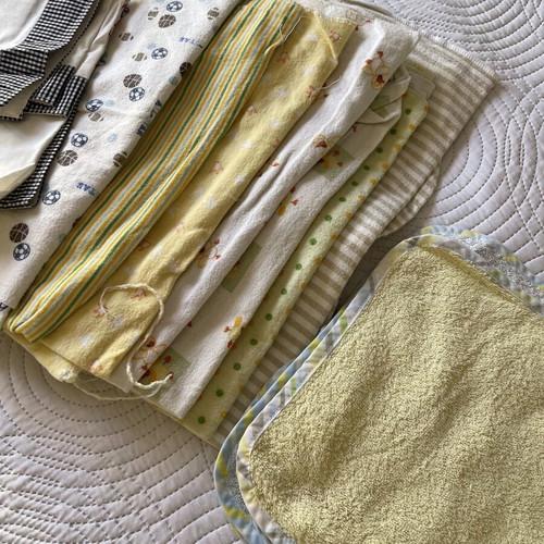Baby trousseau set like new with basket, stroller, crib sheets and small towels