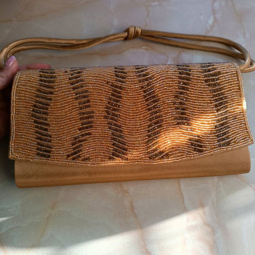 Gold beaded hand bag like new