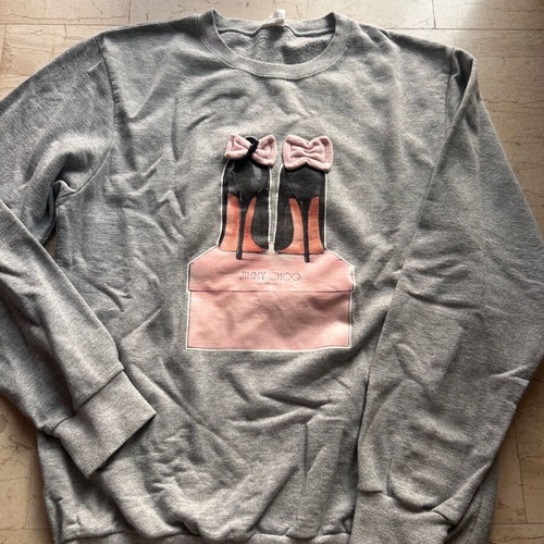 Women's gray sweatshirt like new, size large with shoe print