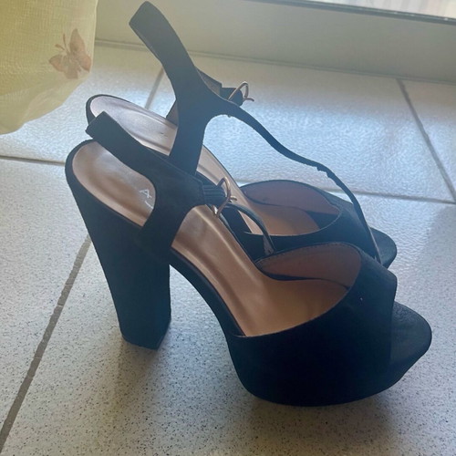 High-heeled castor sandals like new, black, size 37