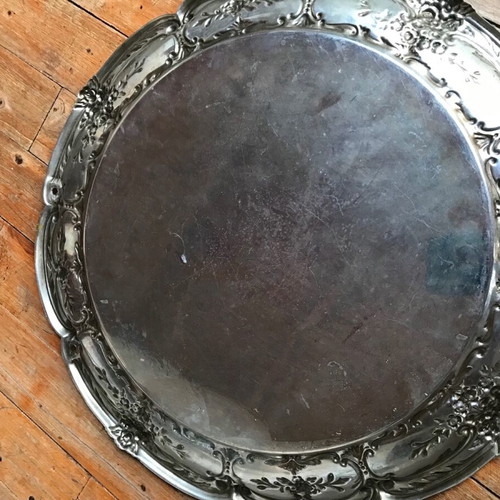Silver-plated round disc used with age damage